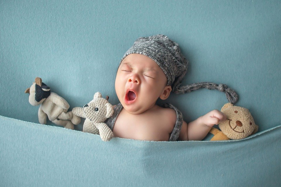 Baby yawning and falling asleep