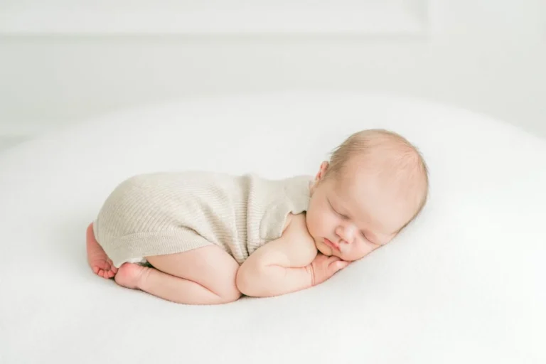 Baby safely on their front and sleeping